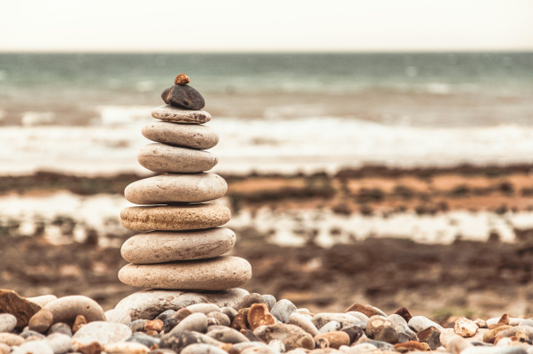Balanced stack of pebbles on a pebbly beach - building blocks of a landing zone
