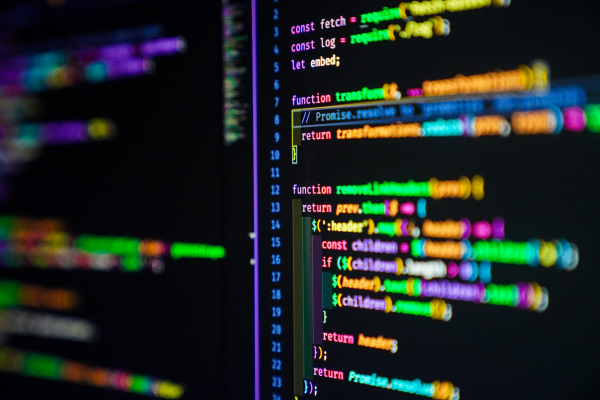 Colourful lines of code on a dark screen - automation through code