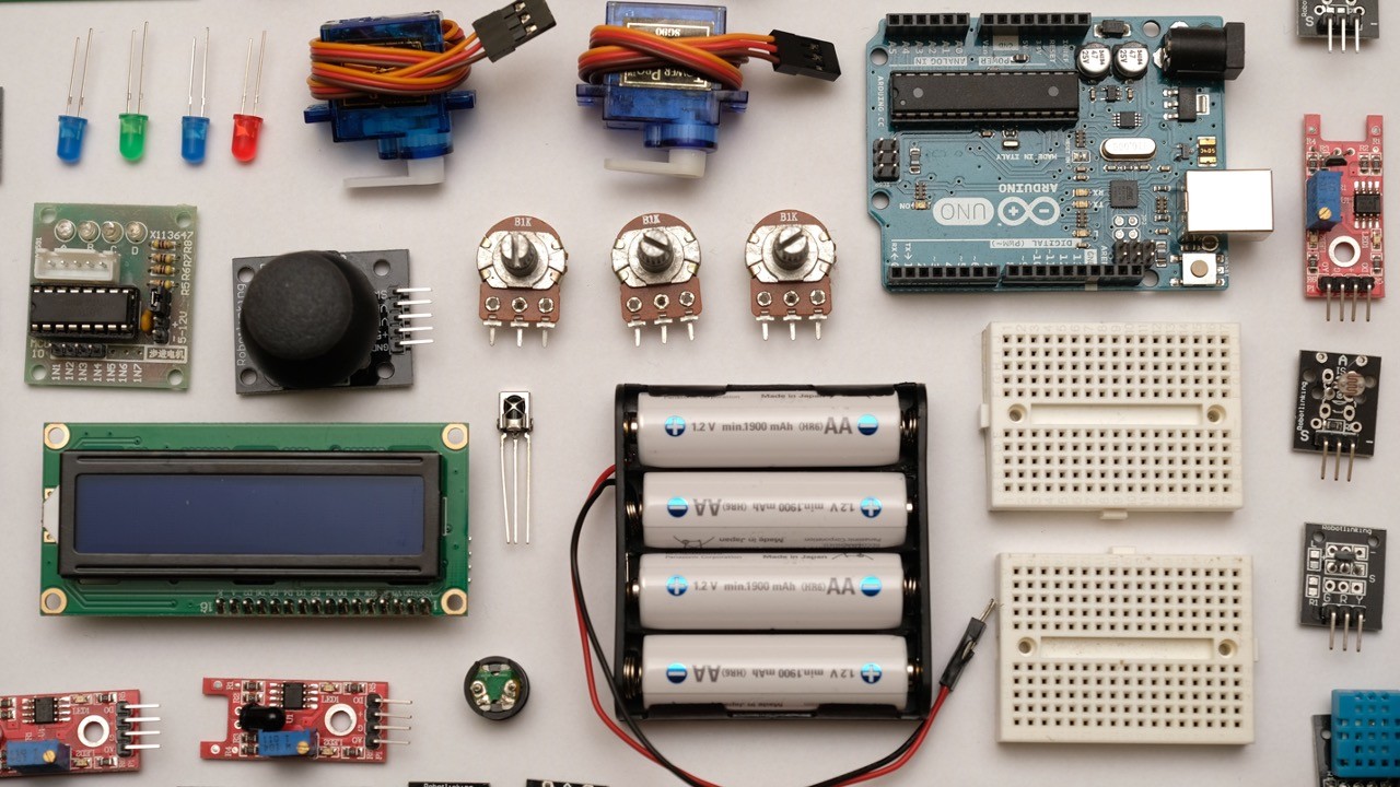 Arduino board and electronic components laid out - designing with discrete building blocks