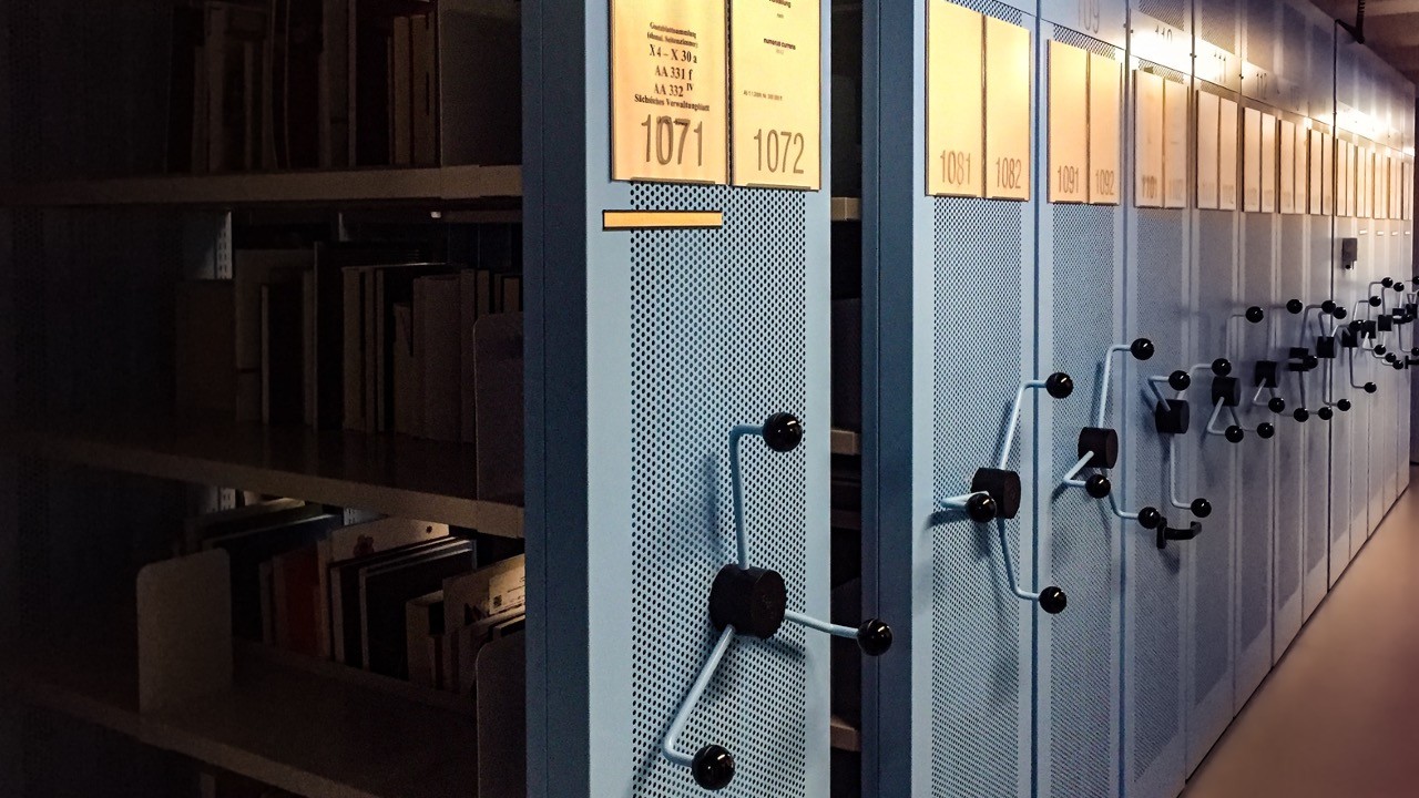 Rows of numbered archive filing cabinets - organised, numbered state storage