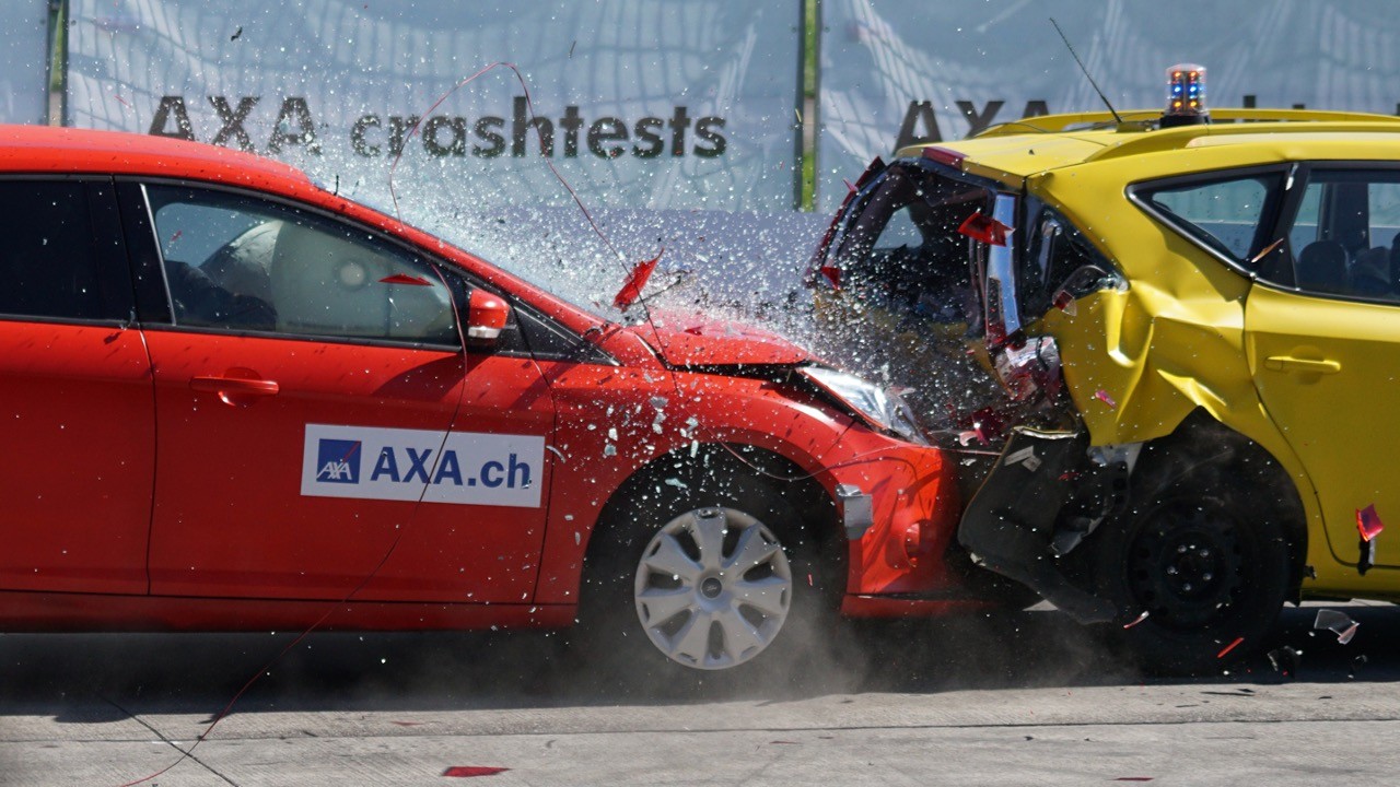 Two cars colliding in an AXA crash test - real impact testing, not just simulations